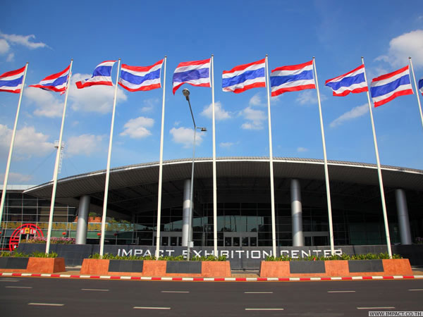 Front of the Impact Exhibition Center with Thai flags in the wind