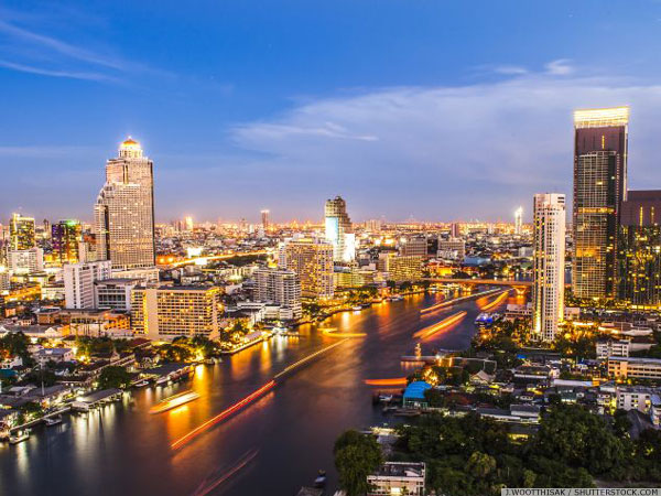 Hotels along the Chao Phraya River after sunset