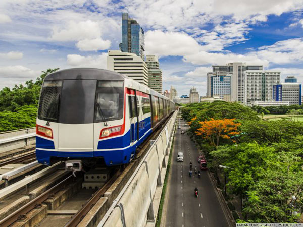 BTS Skytrain traveling through metropolitan Bangkok