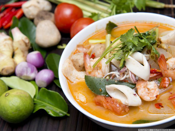 Bowl of Tom Yam seafood with some ingredients