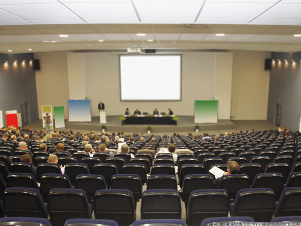 Delegates at a convention in a function room